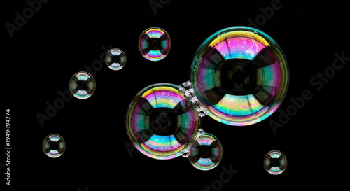 Vibrant iridescent bubbles floating freely.