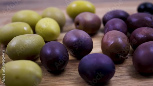 Various varieties of fermented olives (Olea europaea), with a glossy texture after the bitterness has been removed