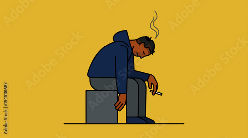 Man sitting with head down smoking a cigarette.