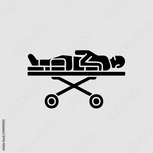 black and white illustration of a person lying on a stretcher