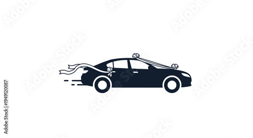 A black car speeding on road.