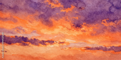 Dramatic orange and red sunset clouds create a beautiful fire in the sky over a summer mountain landscape at dusk