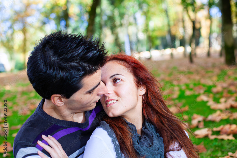 Fototapeta premium Young couple having fun at the park