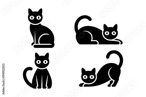 Set of four black cat vector silhouettes in different postures and positions