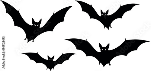Four black bat silhouettes flying on a white background for halloween decoration