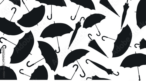 Black and white umbrella pattern with various silhouettes on a white background