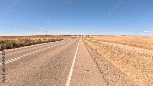 French Way of Saint James - P-980 paved road near Carrion de los Condes, province of Palencia, Castile and Leon, Spain