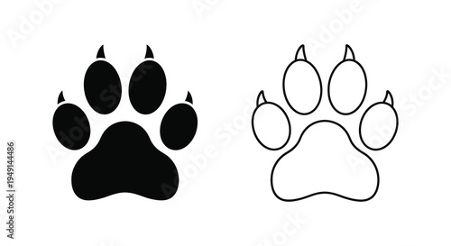 Two contrasting paw prints one dark and one light in graphic silhouette
