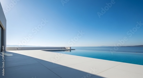 Modern luxury villa terrace with infinity pool overlooking the ocean