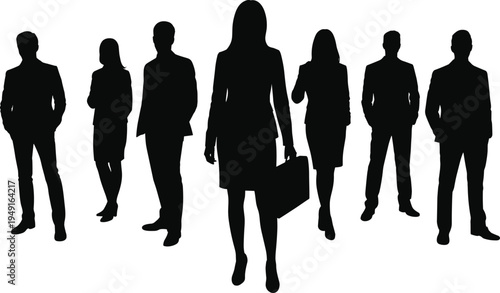 Diverse group of business professionals in silhouette standing together conveying unity and teamwork in a corporate setting