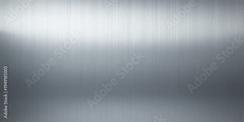 Polished stainless steel plate featuring a brushed metal texture with a shiny silver metallic surface and light reflection pattern on a gray aluminum backdrop sheet design