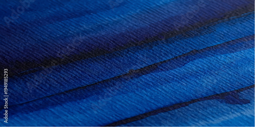 A seamless close up of a blue denim fabric texture showing a detailed cotton textile pattern and light macro design for a fashion material background