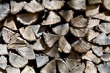 Fototapete Brennholz Textur Stacked firewood cross section texture  © Hirofumi Wabe