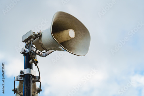 Fotografie Outdoor Public Address Loudspeaker Mounted On Metal Pole