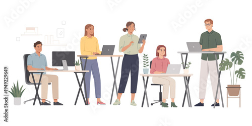 A group of people working together in a modern office with laptops and plants