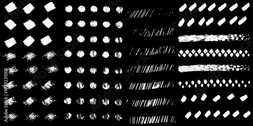 Abstract arrangement of various white brush strokes on a black background
