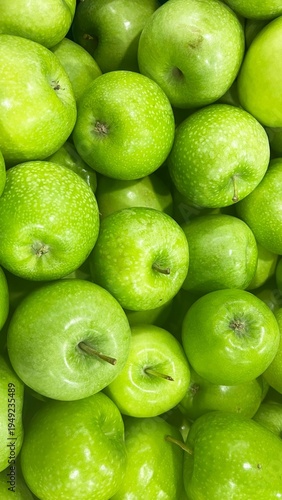 Fresh ripe green apples as background