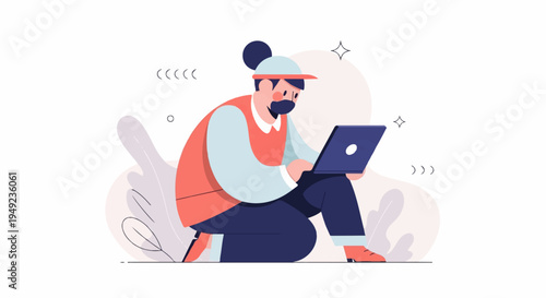 A person with a beard and cap is working on a laptop while sitting