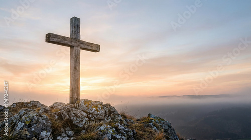 Wooden Cross on Hill at Sunrise Christian Good Friday Symbol with Copy Space