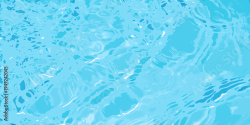 Abstract view of rippling blue water with light reflections