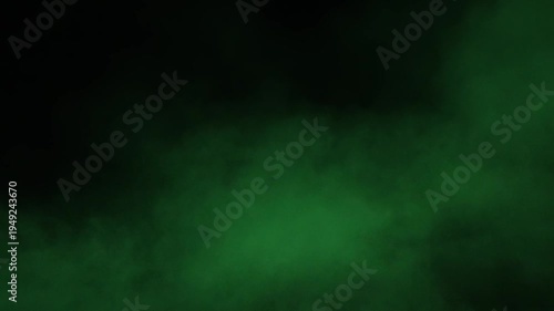 Green smoke and dust on a black background. Fast-moving fog and smog 4K video
