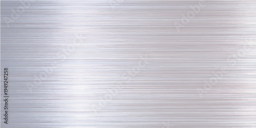 A brushed metallic steel plate texture features a gray striped surface with fine lines, creating a blank industrial backdrop and a sleek gray pattern on a textured material sheet