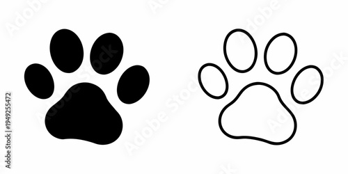 Two contrasting paw prints one black one white side by side