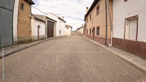Main street in Calzadilla de la Cueza, municipality of Cervatos de la Cueza, province of Palencia, Castile and Leon, Spain