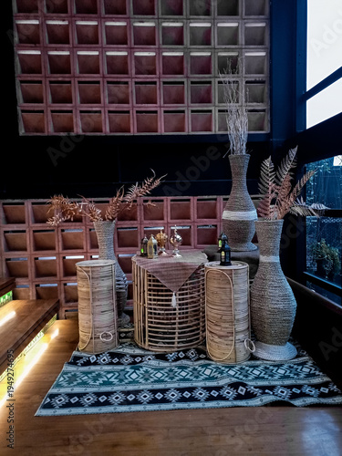 Cozy Bohemian Interior Corner with Rattan Furniture and Natural Decor