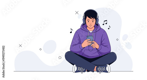 Young man listening to music on headphones with smartphone, sitting cross-legged