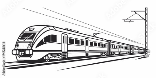 A sleek, modern train speeding along the tracks under a street light.