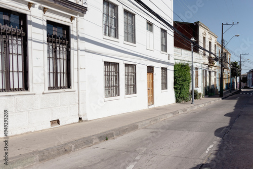 Historic street with colorful traditional houses in Valparaiso, Chile