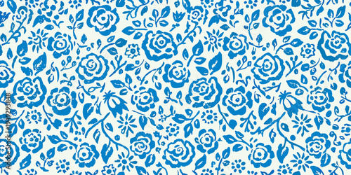 A repeating pattern of blue floral designs on a white background