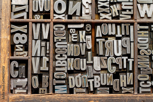 Schilderij op canvas Old printing press letters, known as movable type