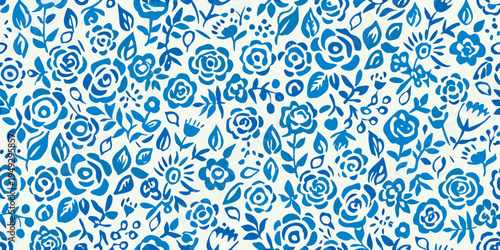 Blue and white floral pattern with stylized rose and blossom motifs