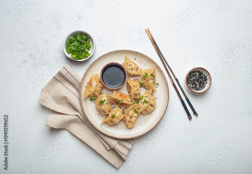 Gyoza dumplings soy sauce chopsticks asian Japanese food wontons