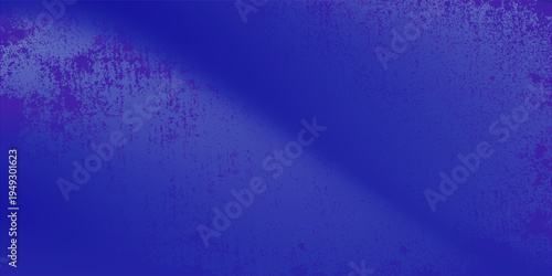 A close-up of the rich, deep indigo fabric shows a fine, textured weave with a subtle