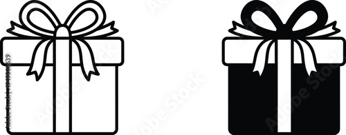 Two elegantly wrapped gifts with ribbons on a plain background