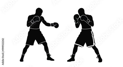 Two boxers in fighting stance a dramatic black silhouette