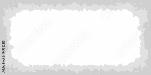 A white rectangular shape surrounded by a jagged gray border