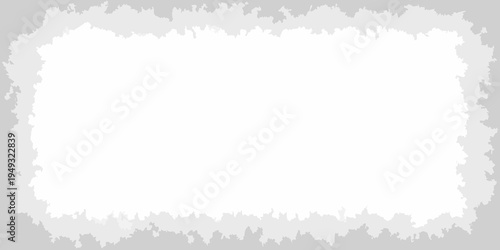 A rectangular white space framed by a jagged gray textured border