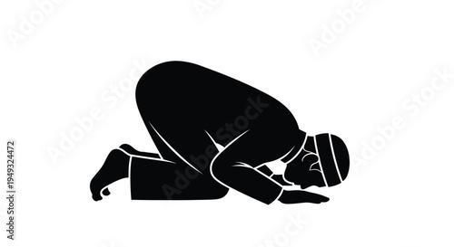 A person kneeling in prayer depicted as a striking silhouette