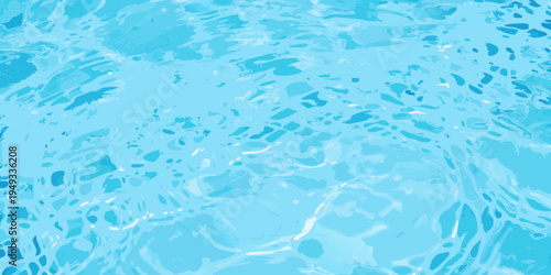 Abstract view of rippling light blue water with dynamic reflections