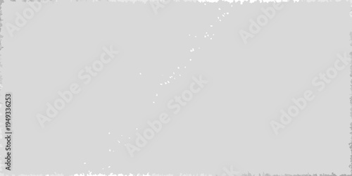 Abstract gray background with scattered white speckles and texture