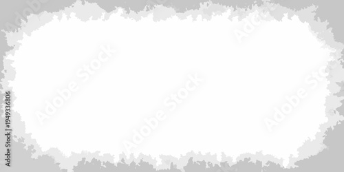 A torn paper edge revealing a blank white space underneath