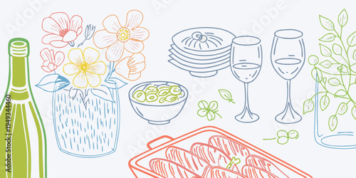 A celebratory table setting featuring flowers food and champagne glasses