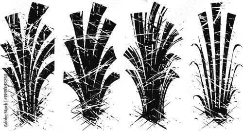 Set of four black and white abstract grass silhouettes with grunge and scratch texture effects