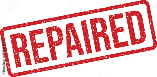 A bold red rubber stamp with the word REPAIRED clearly visible on a bright white background