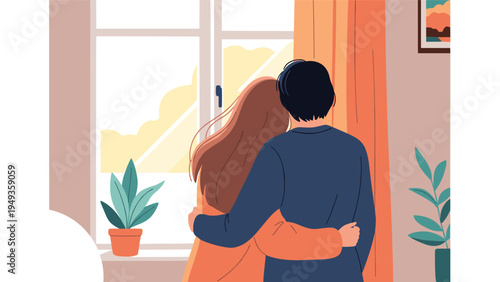 Loving couple standing together and hugging while looking out through a large window during a quiet morning at home.