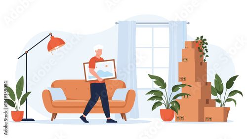 Man carrying a framed picture while moving into a new apartment with several cardboard boxes stacked in the room.